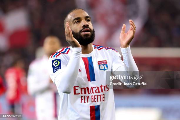 Alexandre Lacazette of Lyon salutes the supporters following the Ligue 1 match between Lille OSC and Olympique Lyonnais at Stade Pierre-Mauroy on...