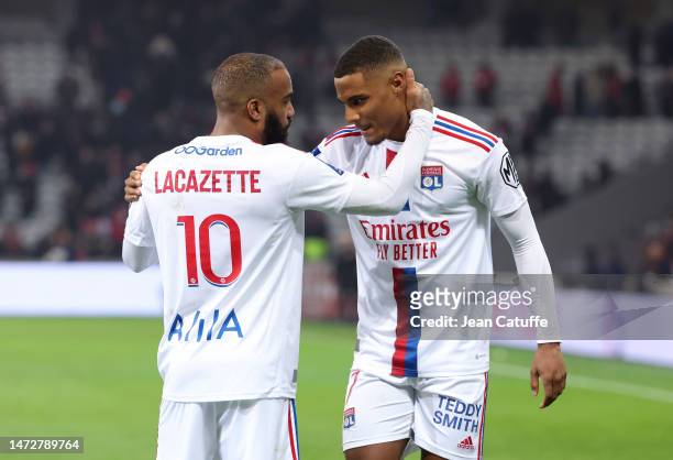 Amin Sarr, Alexandre Lacazette of Lyon following the Ligue 1 match between Lille OSC and Olympique Lyonnais at Stade Pierre-Mauroy on March 11, 2023...