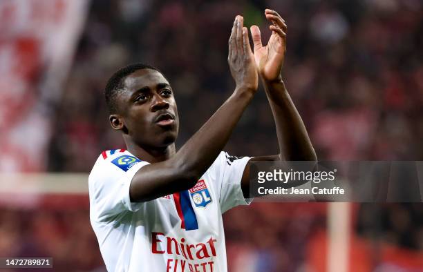 Sael Kumbedi Nseke of Lyon salutes the supporters following the Ligue 1 match between Lille OSC and Olympique Lyonnais at Stade Pierre-Mauroy on...