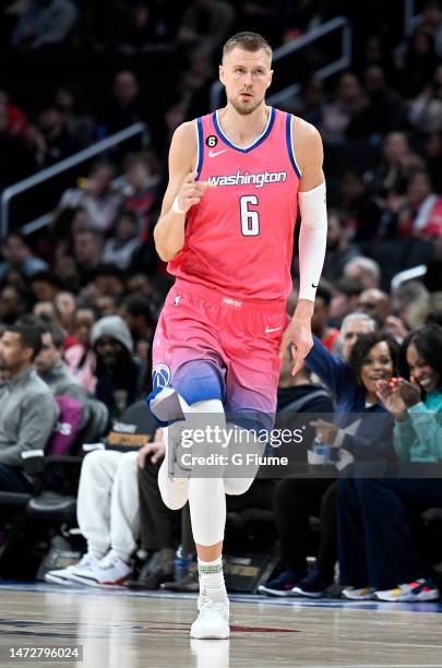 Kristaps Porzingis of the Washington Wizards celebrates during the game against the Atlanta Hawks at Capital One Arena on March 08, 2023 in...
