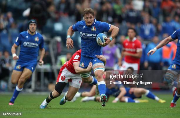 Lorenzo Cannone makes a run during the Six Nations Rugby match between Italy and Wales at Stadio Olimpico on March 11, 2023 in Rome, Italy.