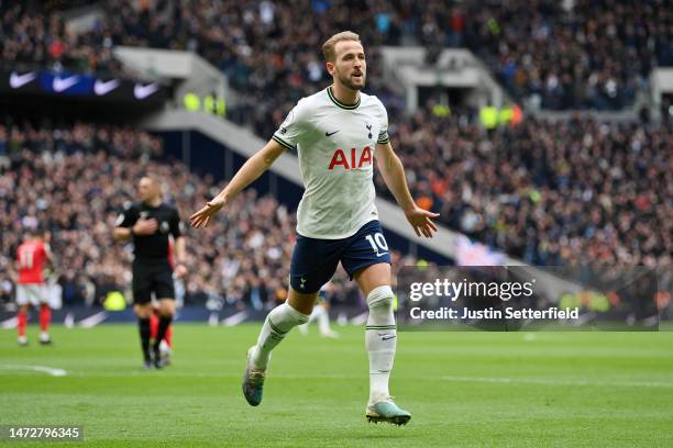 Harry Kane of Tottenham Hotspur celebrates after scoring the team's first goal during the Premier League match between Tottenham Hotspur and...