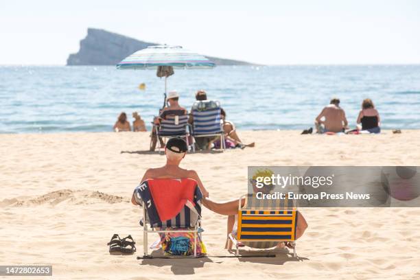 Numerous people bathe and sunbathe on the Poniente beach, on 11 March, 2023 in Benidorm, Alicante, Valencian Community, Spain. During this weekend,...