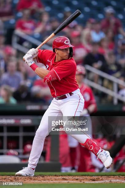 Spencer Steer of the Cincinnati Reds bats in the first inning against the Arizona Diamondbacks during a spring training game at Goodyear Ballpark on...