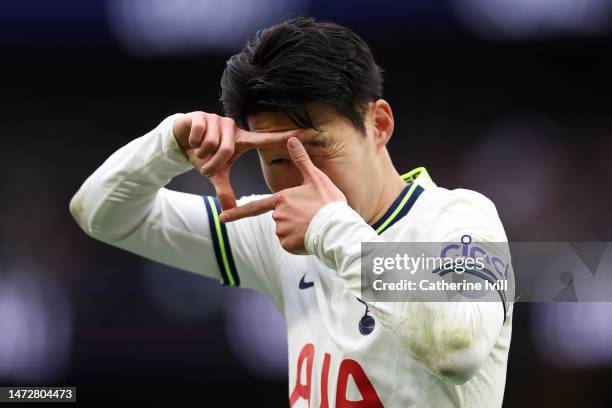 Son Heung-Min of Tottenham Hotspur celebrates after scoring the team's third goal during the Premier League match between Tottenham Hotspur and...