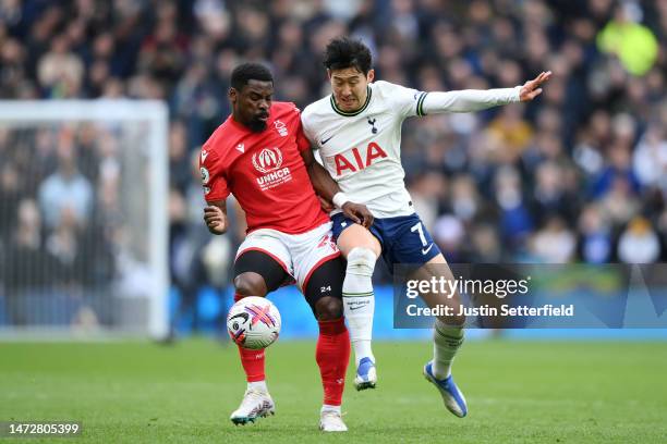 Serge Aurier of Nottingham Forest battles for possession with Son Heung-Min of Tottenham Hotspur during the Premier League match between Tottenham...