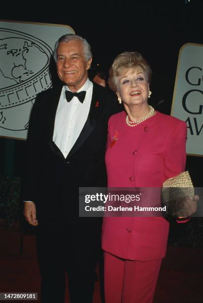British film producer and actor Peter Shaw and his wife, British-American actress Angela Lansbury attend the 51st Golden Globe Awards, held at the...