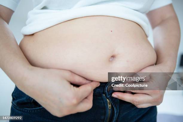 health - overweight - stomaco foto e immagini stock