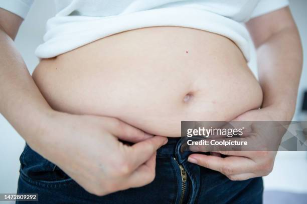 health  - overweight - obesity concept stock pictures, royalty-free photos & images