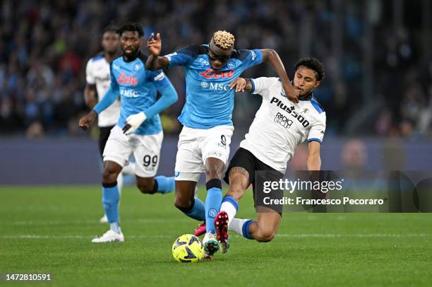 Victor Osimhen of SSC Napoli is challenged by Ederson of Atalanta BC during the Serie A match between SSC Napoli and Atalanta BC at Stadio Diego...