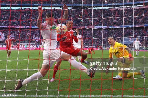 Leroy Sane of FC Bayern Munich scores the team's fourth goal during the Bundesliga match between FC Bayern Muenchen and FC Augsburg at Allianz Arena...
