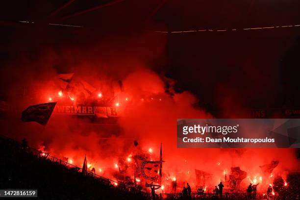 Borussia Dortmund fans release flares inside the stadium during the Bundesliga match between FC Schalke 04 and Borussia Dortmund at Veltins-Arena on...
