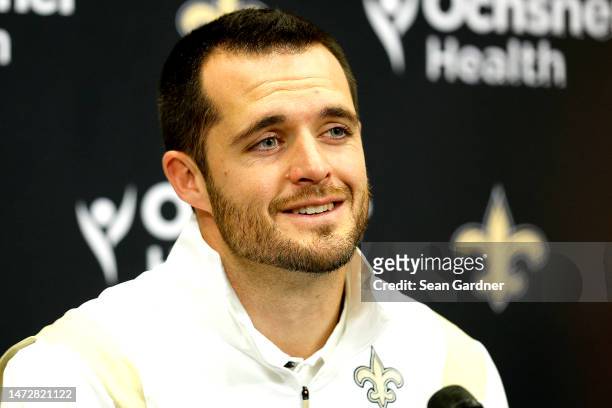 Quarterback Derek Carr of the New Orleans Saints speaks to members of the media after signing a four-year contract with the Saints at New Orleans...