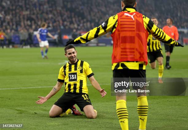 Raphael Guerreiro of Borussia Dortmund celebrates after scoring the team's second goal during the Bundesliga match between FC Schalke 04 and Borussia...