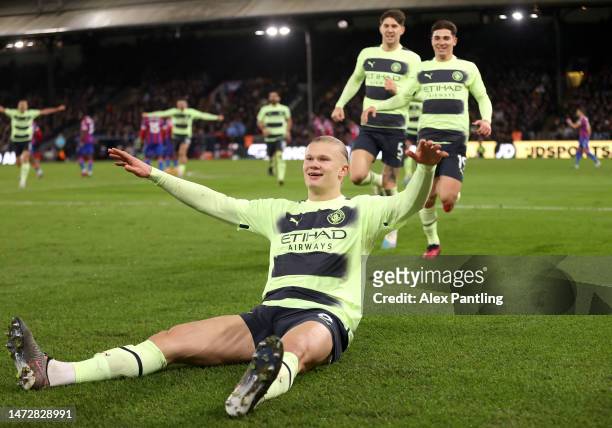 Erling Haaland of Manchester City celebrates after scoring the team's first goal from the penalty spot during the Premier League match between...