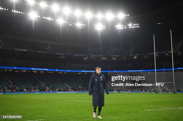 Jack van Poortvliet of England looks dejected as they leave the field after the Guinness Six Nations Rugby match between England and France at...