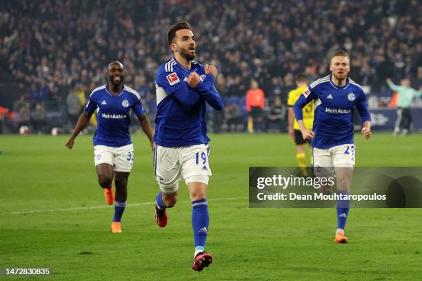 Kenan Karaman of FC Schalke 04 celebrates after scoring the team's second goal during the Bundesliga match between FC Schalke 04 and Borussia...