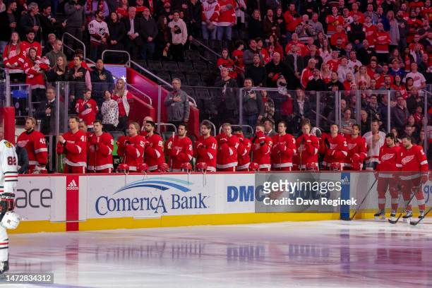 Players from the Detroit Red Wings stands for the National Anthem before the start of an NHL game against the Chicago Blackhawks at Little Caesars...