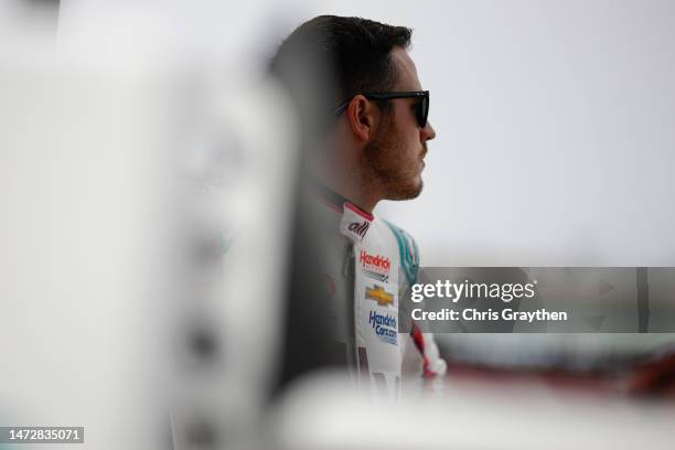 Alex Bowman, driver of the Ally Best Friends Chevrolet, looks on during qualifying for the NASCAR Cup Series United Rentals Work United 500 at...