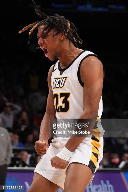 Jayden Nunn of the Virginia Commonwealth Rams reacts after dunking the ball against the Saint Louis Billikens in the second half during the...