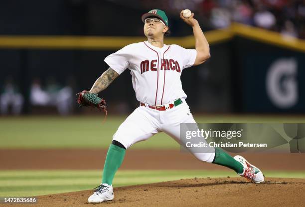 Starting pitcher Julio Urías of Team Mexico pitches against Team Colombia during the first inning of the World Baseball Classic Pool C game at Chase...