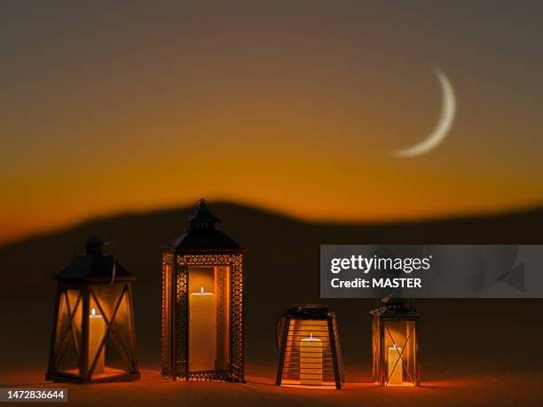 ramadan lanterns in desert - eid al fitr celebration to mark the end of ramadan stockfoto's en -beelden