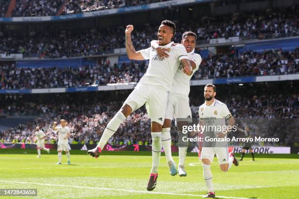 Eder Gabriel Militao of Real Madrid CF celebrates scoring their second goal with teammates Rodrygo Goes and Nacho Fernandez during the LaLiga...