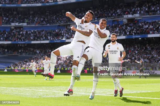 Eder Gabriel Militao of Real Madrid CF celebrates scoring their second goal with teammates Rodrygo Goes and Nacho Fernandez during the LaLiga...
