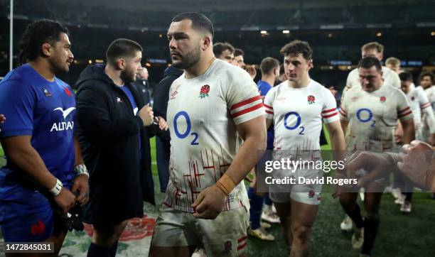 Ellis Genge, the England captain, looks dejected as he leads his team off the pitch after their defeat during the Six Nations Rugby match between...