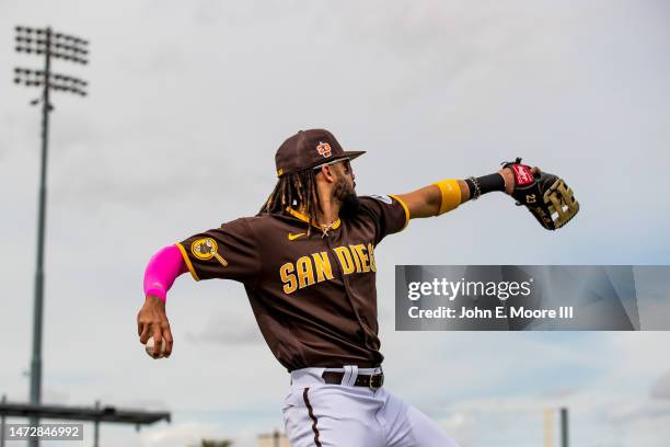 Fernando Tatis Jr. #23 of the San Diego Padres warms up before the Spring Training Game against the Chicago White Sox at Peoria Stadium on March 11,...