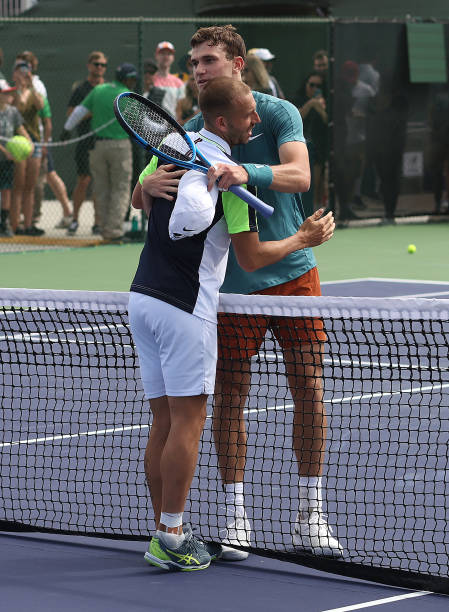 Dan Evans of Great Britain congratulates Jack Draper of Great Britain during the BNP Paribas Open on March 11, 2023 in Indian Wells, California.