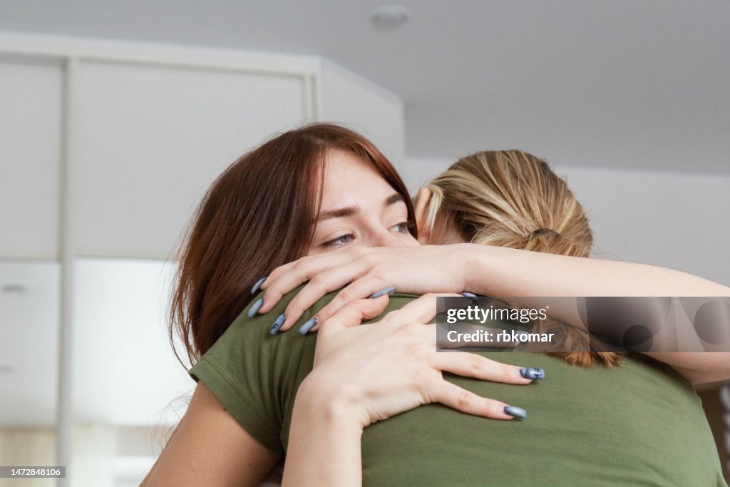 Forgiveness - supporting mother and hugging daughter
