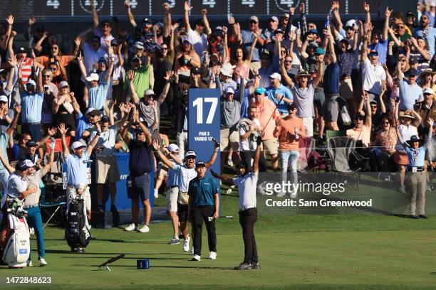 Aaron Rai of England celebrates his hole-in-one on the 17th tee during the third round of THE PLAYERS Championship on THE PLAYERS Stadium Course at...