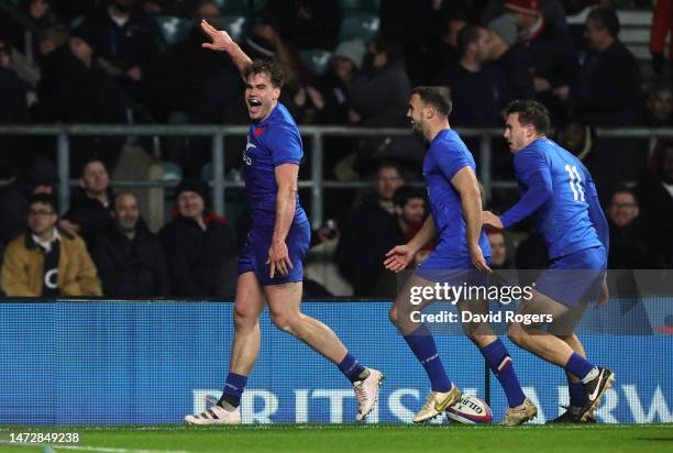 Damian Penaud of France celebrates after scoring their seventh try during the Six Nations Rugby match between England and France at Twickenham...
