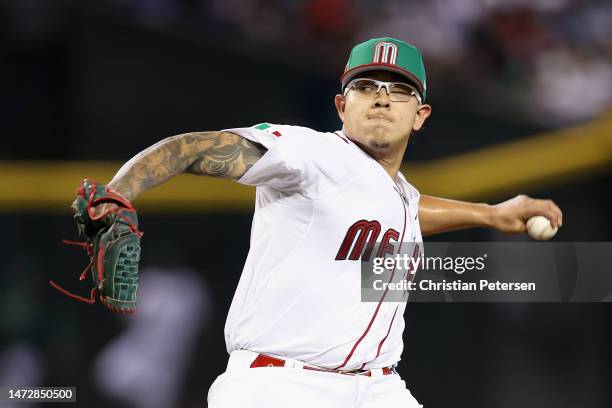 Starting pitcher Julio Urías of Team Mexico pitches against Team Colombia during the first inning of the World Baseball Classic Pool C game at Chase...