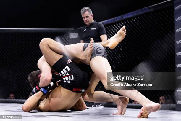 Adam el Bakali and Alejandro Sobrino fight during the Mixed Martial Arts competition "WOW 8. El Camino del Guerrero" at Palacio de Vistalegre Arena...