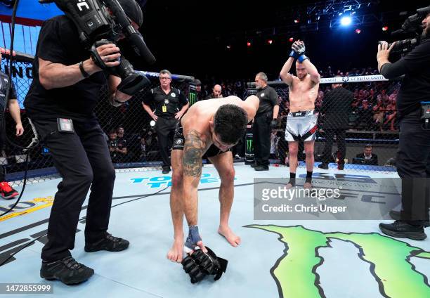 Raphael Assuncao of Brazil announces his retirement from MMA after his loss to Davey Grant of England in a bantamweight fight during the UFC Fight...
