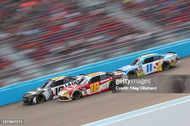 Kyle Busch, driver of the LA Golf Chevrolet, Sammy Smith, driver of the Pilot Flying J Toyota, and Daniel Hemric, driver of the Cirkul Chevrolet,...