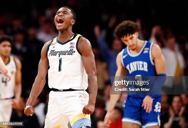 Kam Jones of the Marquette Golden Eagles reacts during the first half against the Xavier Musketeers in the Big East Basketball Tournament...