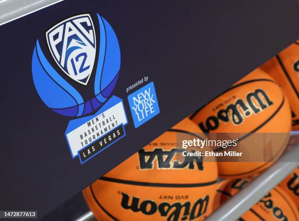 Pac-12 Conference men's basketball tournament logo is shown on the side of a ball rack before the championship game of the tournament between the...