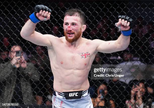 Merab Dvalishvili of Georgia reacts after the conclusion of his bantamweight fight against Petr Yan of Russia during the UFC Fight Night event at The...