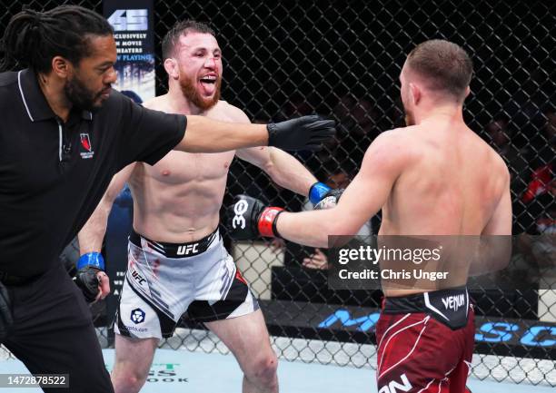 Merab Dvalishvili of Georgia reacts after the conclusion of his bantamweight fight against Petr Yan of Russia during the UFC Fight Night event at The...