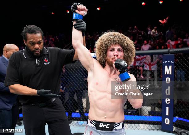 Merab Dvalishvili of Georgia reacts after his unanimous-decision victory over Petr Yan of Russia in a bantamweight fight during the UFC Fight Night...