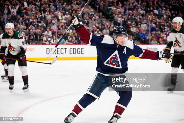 Cale Makar of the Colorado Avalanche celebrates after scoring the game-winning goal in overtime against the Arizona Coyotes at Ball Arena on March...