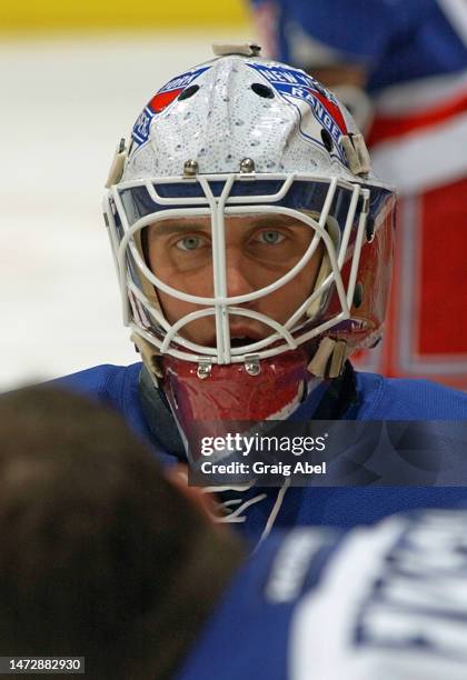 Mike Dunham of the New York Rangers skates against the Toronto Maple Leafs during NHL game action on December 14, 2002 at Air Canada Centre in...