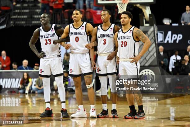 Aguek Arop, Keshad Johnson, Micah Parrish and Matt Bradley of the San Diego State Aztec sstand on the court during the second half of the...