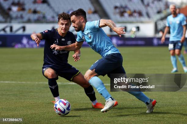 Anthony Caceres of Sydney FC competes with Callan Elliot of Wellington Phoenix during the round 20 A-League Men's match between Wellington Phoenix...