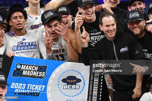 The UC Santa Barbara Gauchos celebrate defeating Cal State Fullerton in the Big West Conference men's basketball championship game at The Dollar Loan...