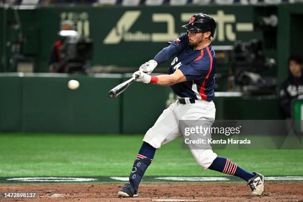 Eric Sogard of the Czech Republic hits a single in the seventh inning during the World Baseball Classic Pool B game between Czech Republic and Korea...