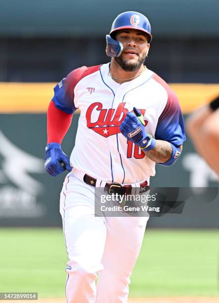 Yoán Moncada of Team Cuba hits a solo homerun at the bottom of the 2nd inning during the World Baseball Classic Pool A game between Chinese Taipei...